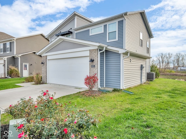 view of front facade featuring central AC unit, a garage, and a front yard