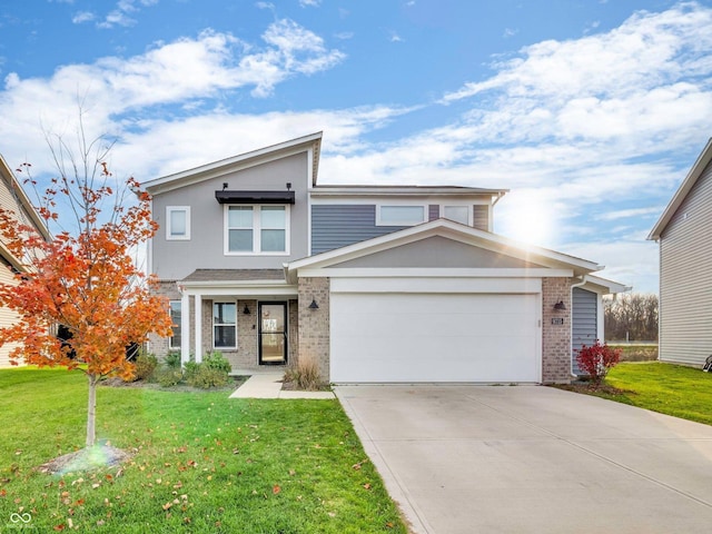 view of front of property featuring a garage and a front yard