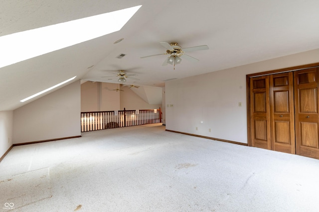 4257 Tattersall Dr, Plainfield, IN 46168 - additional living space with a skylight, carpet floors, ceiling fan, vaulted ceiling, and baseboards