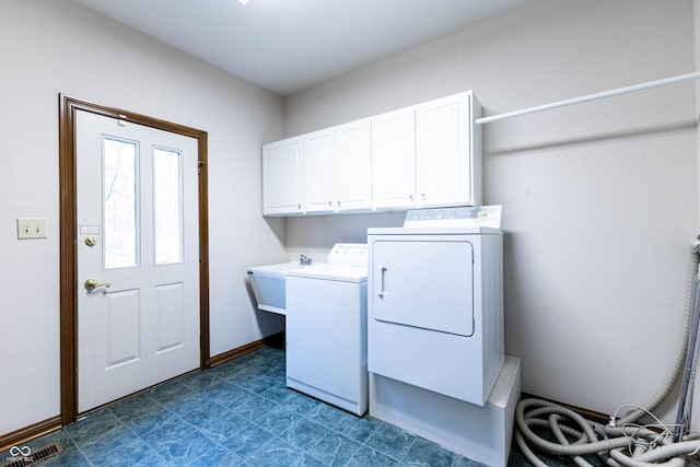 4257 Tattersall Dr, Plainfield, IN 46168 - laundry room featuring cabinet space, separate washer and dryer, and dark floors