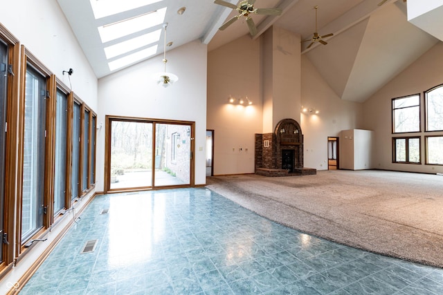 4257 Tattersall Dr, Plainfield, IN 46168 - unfurnished living room with high vaulted ceiling, a brick fireplace, ceiling fan, carpet, and beam ceiling