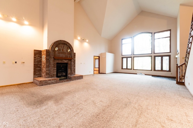 4257 Tattersall Dr, Plainfield, IN 46168 - unfurnished living room featuring high vaulted ceiling, carpet floors, and baseboards