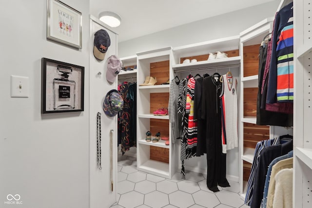 walk in closet featuring light tile patterned floors