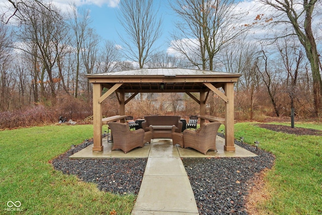 view of patio / terrace with outdoor lounge area and a gazebo