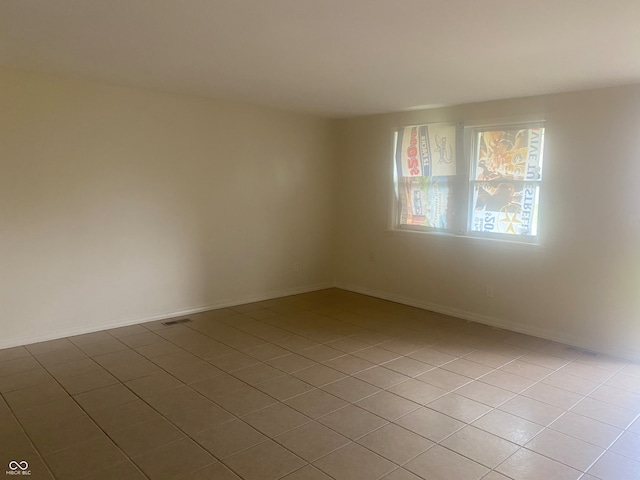 view of tiled spare room