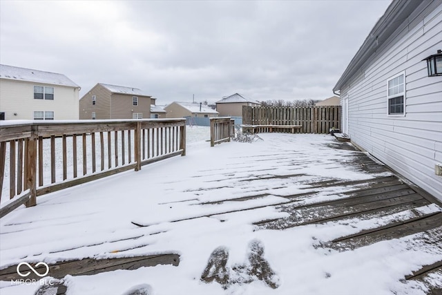 view of snow covered deck