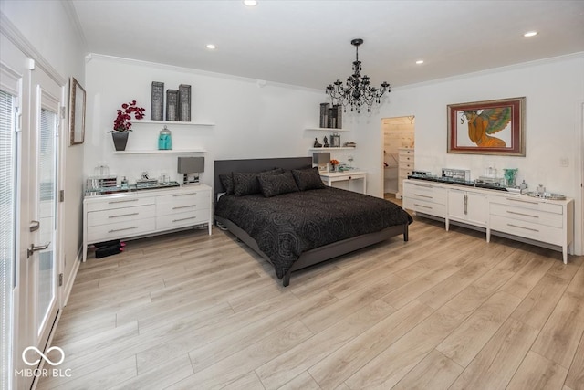 bedroom featuring light hardwood / wood-style floors, crown molding, and a chandelier