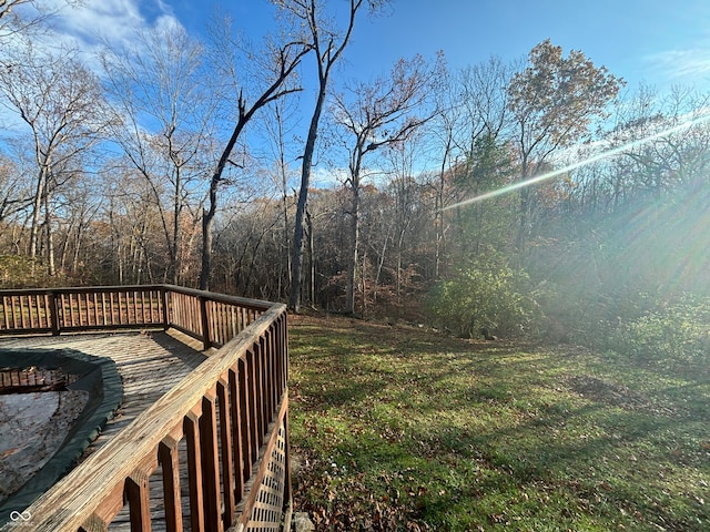 view of yard with a wooden deck