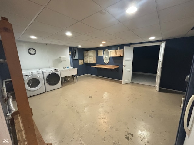 laundry area featuring separate washer and dryer and sink