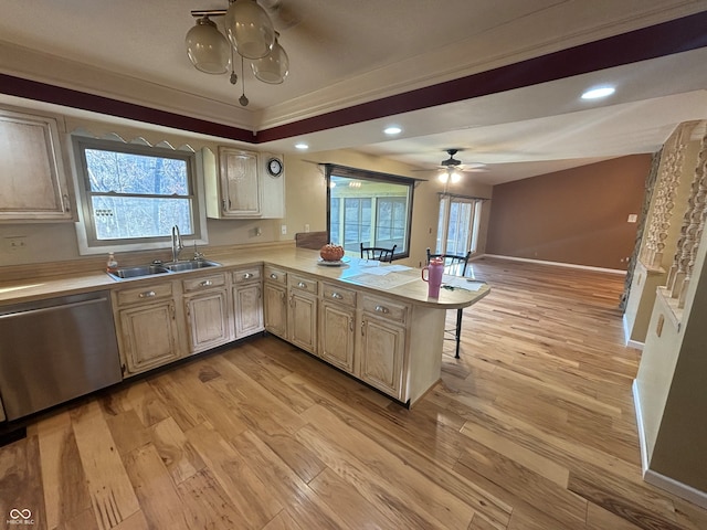 kitchen featuring ceiling fan, sink, stainless steel dishwasher, kitchen peninsula, and light hardwood / wood-style floors