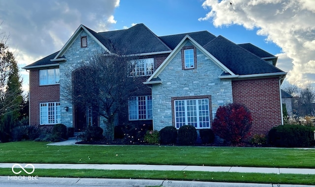 front facade with a front lawn