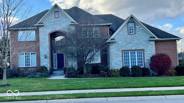 view of front of home with a front yard