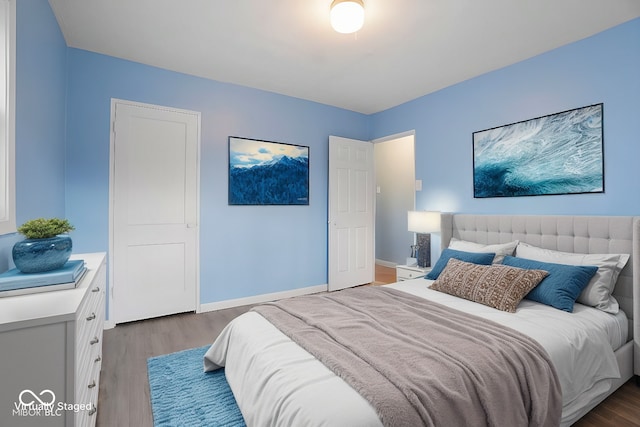 bedroom featuring hardwood / wood-style flooring