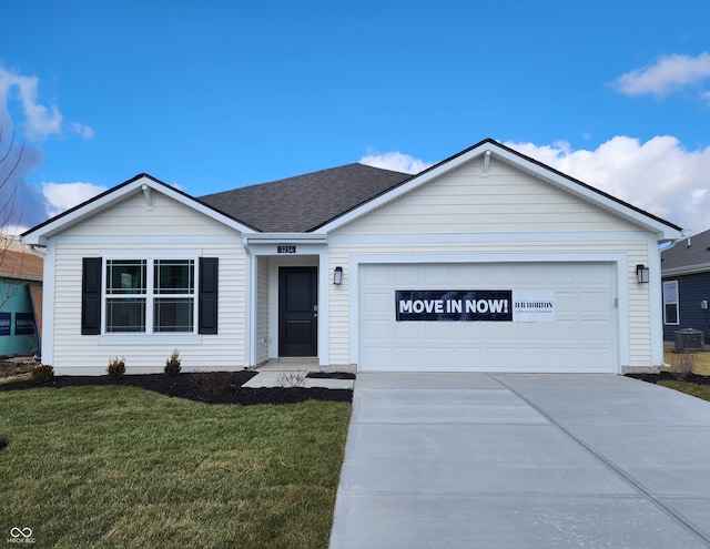 ranch-style house featuring cooling unit, a front lawn, and a garage