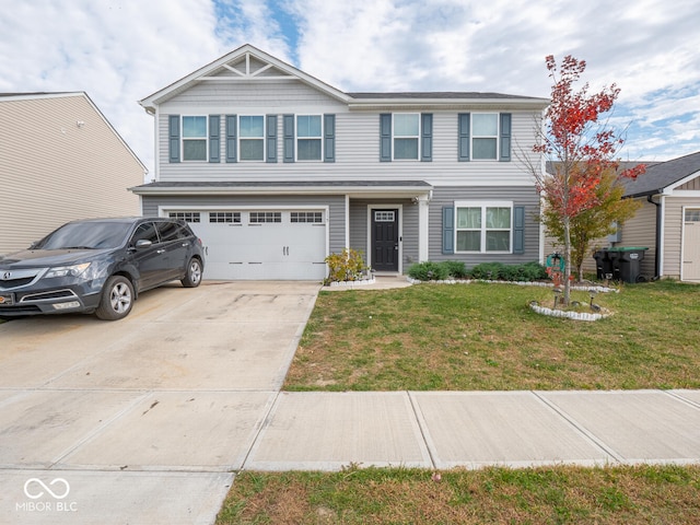 view of front of house featuring a garage and a front lawn