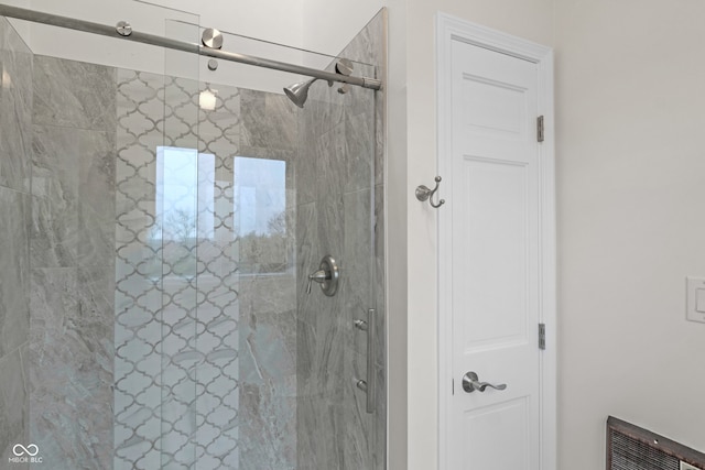 bathroom featuring an enclosed shower