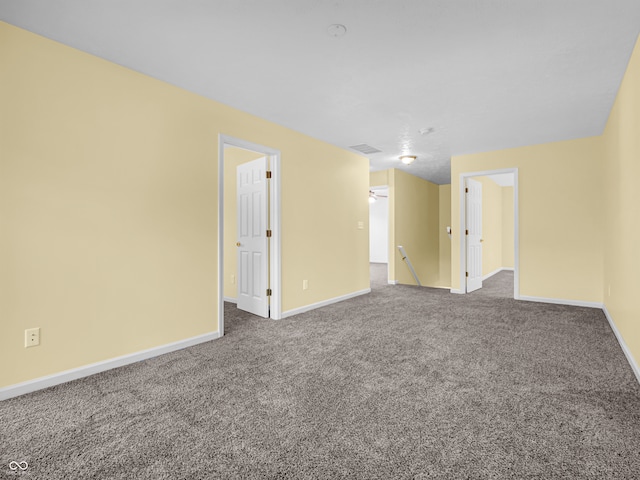 unfurnished room with carpet