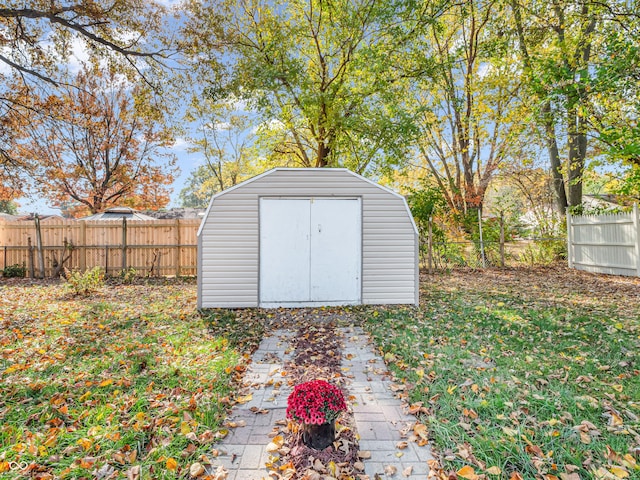 11411 Shady Hollow Ln, Indianapolis, IN 46229 - view of shed featuring a fenced backyard
