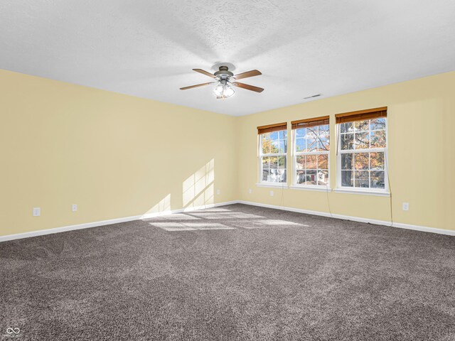 11411 Shady Hollow Ln, Indianapolis, IN 46229 - carpeted empty room featuring ceiling fan, baseboards, and a textured ceiling