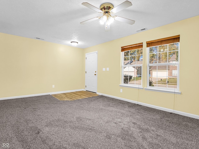 11411 Shady Hollow Ln, Indianapolis, IN 46229 - carpeted empty room featuring baseboards, a ceiling fan, and a textured ceiling