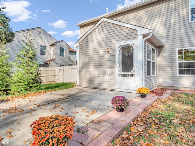 rear view of house featuring a patio