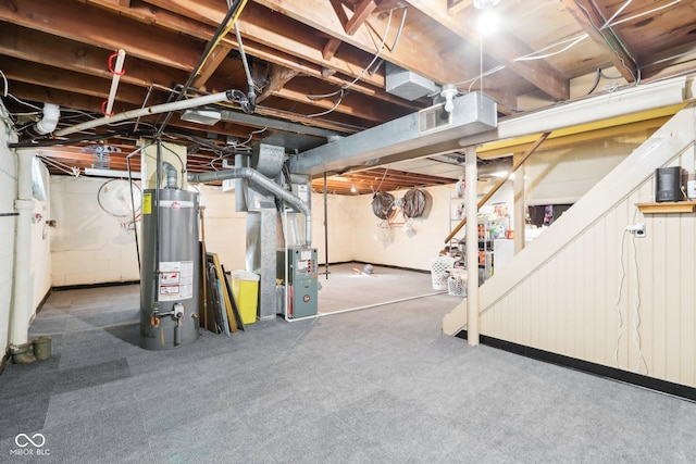 basement featuring heating unit and gas water heater