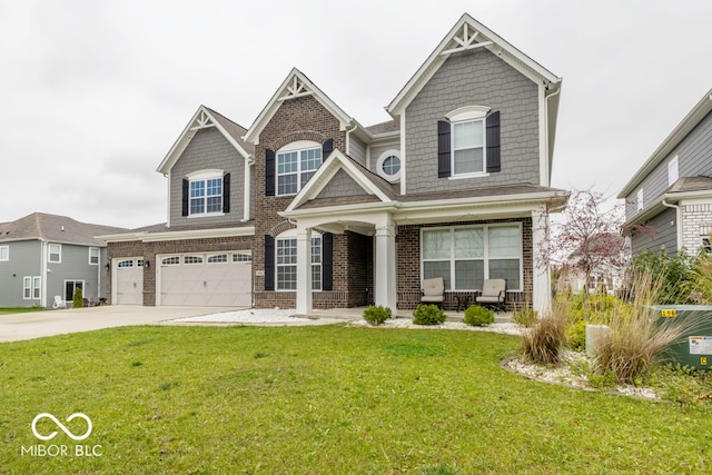 craftsman-style home with a garage, a front lawn, and central air condition unit