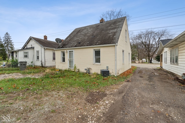 view of front of property featuring central air condition unit