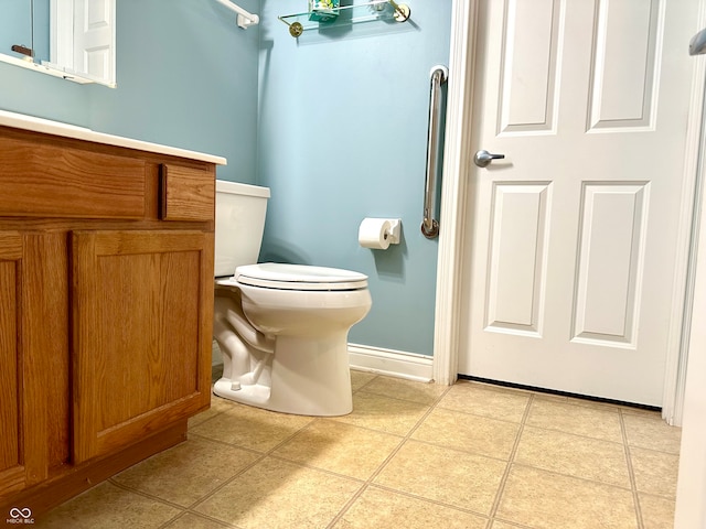 bathroom with tile patterned flooring and toilet