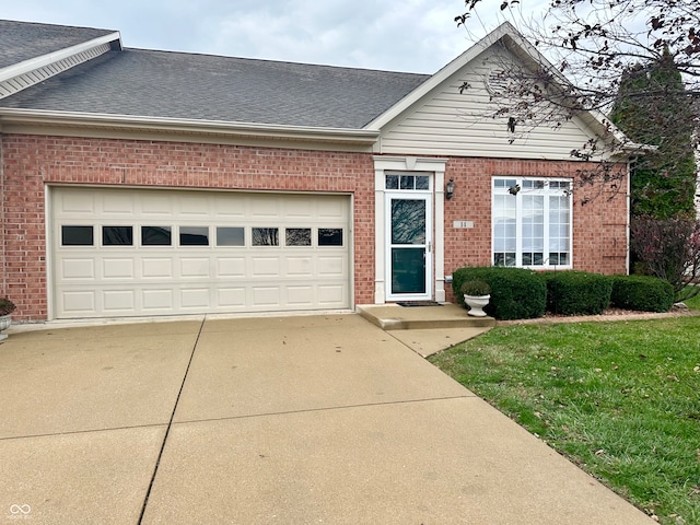 single story home featuring a garage