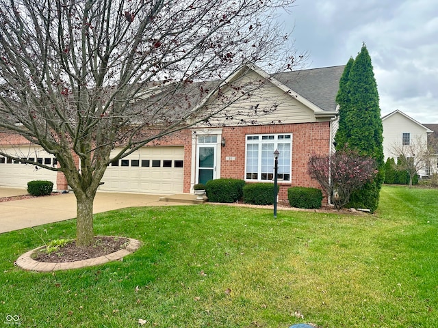 view of front of house with a garage and a front yard