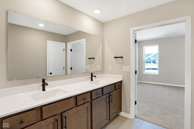 bathroom with vanity and tile patterned flooring