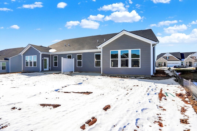 view of snow covered property