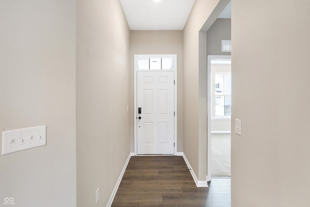 doorway with dark hardwood / wood-style floors