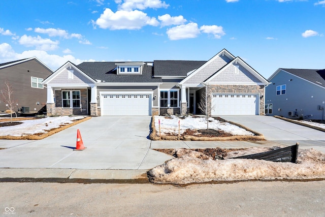 craftsman house with a garage