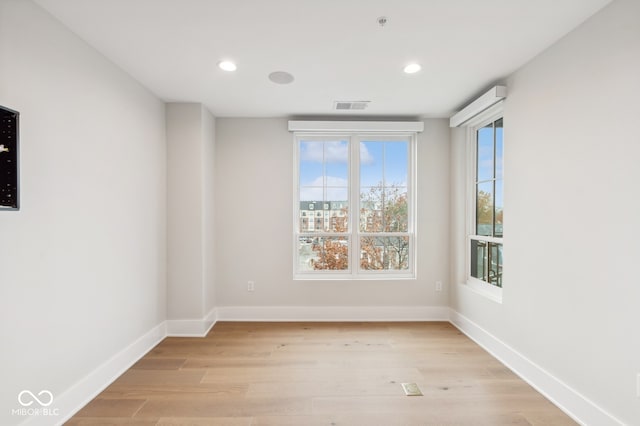 empty room with light wood-type flooring