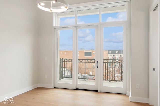 entryway with light hardwood / wood-style floors