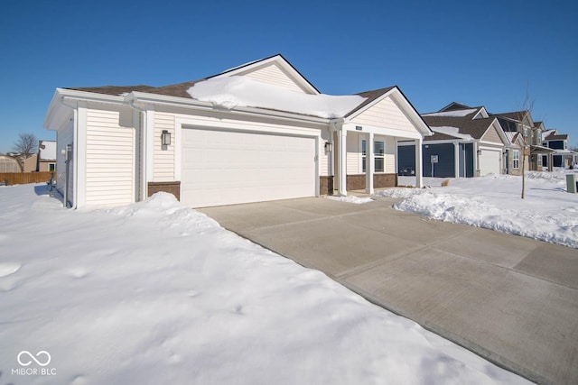 ranch-style home with a garage