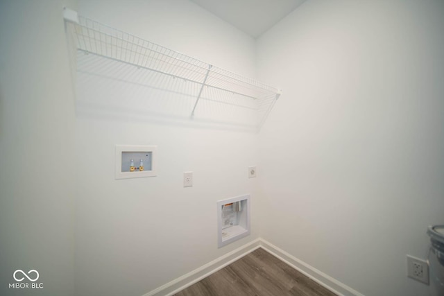 laundry room featuring hardwood / wood-style flooring, hookup for an electric dryer, and washer hookup