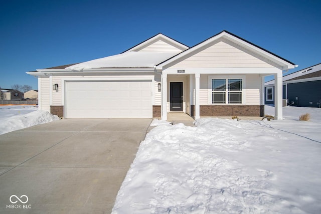 view of front of home with a garage