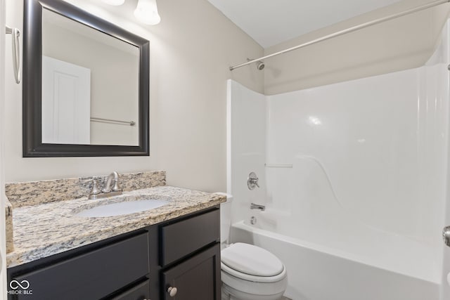 full bathroom with vanity, toilet, and shower / tub combination