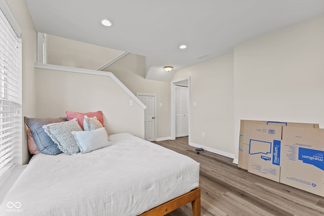 bedroom featuring wood-type flooring