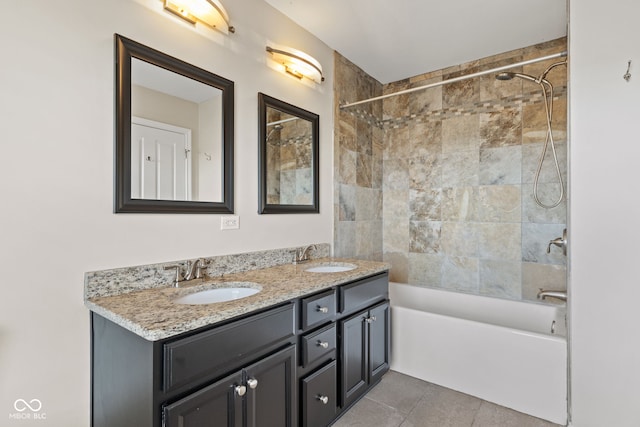 bathroom with vanity, tile patterned floors, and tiled shower / bath combo