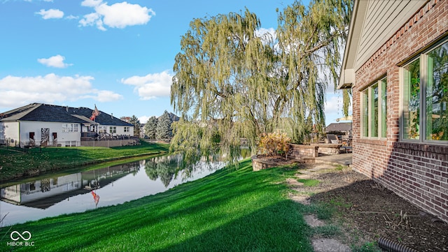 view of yard with a water view