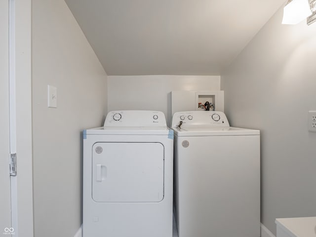 laundry room featuring washing machine and dryer