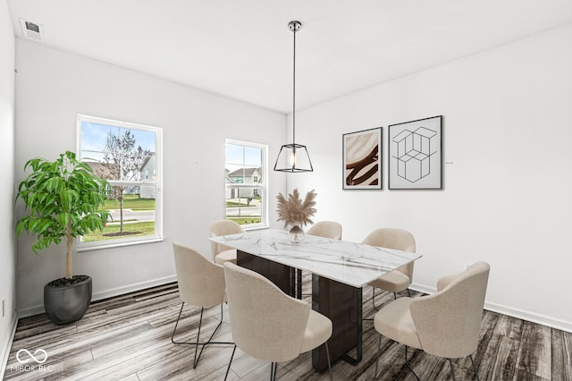 dining room featuring light hardwood / wood-style flooring