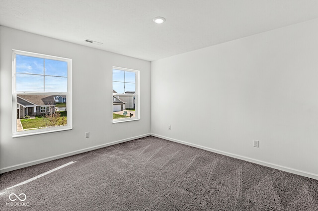 view of carpeted spare room