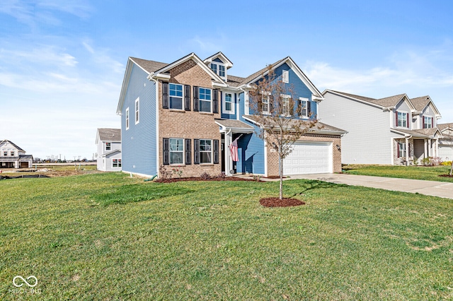 view of front of house featuring a front yard and a garage