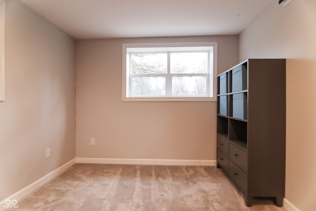 unfurnished bedroom with light carpet