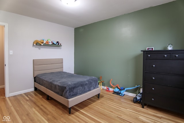 bedroom featuring light wood-type flooring